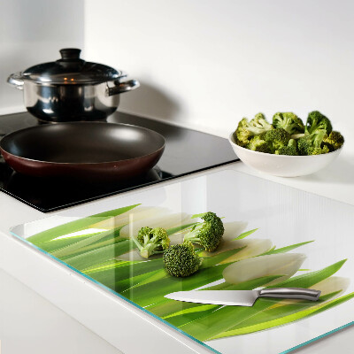 Planche à découper verre Tulipes sur fond de feuilles vertes