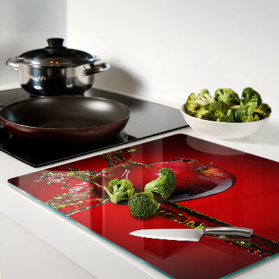 Planche à découper verre Pomme rouge avec de l'eau