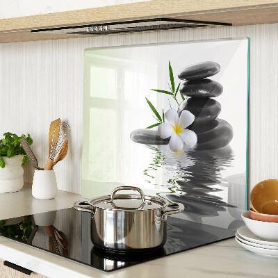 Planche à découper verre Fleurs et pierres sur l'eau