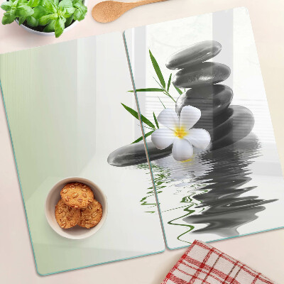 Planche à découper verre Fleurs et pierres sur l'eau