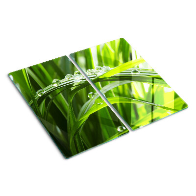 Planche à découper en verre Gouttes d'eau sur l'herbe