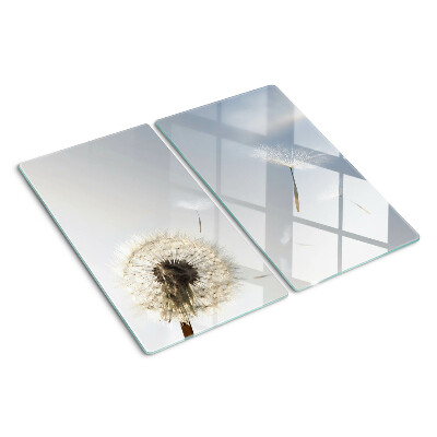 Planche à découper verre Pissenlits en arrière-plan de la fenêtre