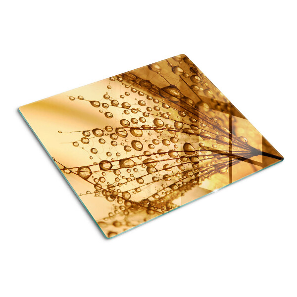 Planche à découper en verre Gouttes d'eau sur une plante