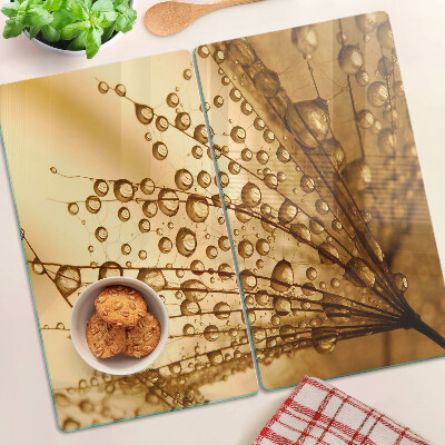 Planche à découper en verre Gouttes d'eau sur une plante