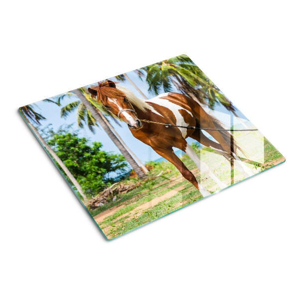 Planche à découper verre Un cheval avec des palmiers en arrière-plan