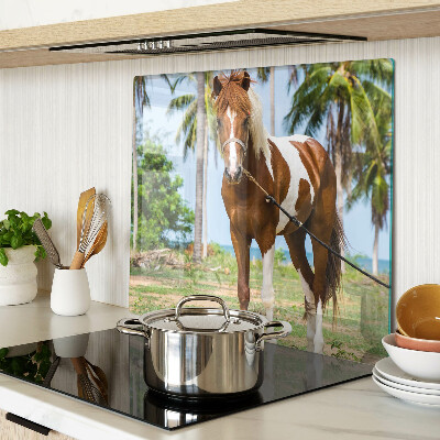 Planche à découper verre Un cheval avec des palmiers en arrière-plan