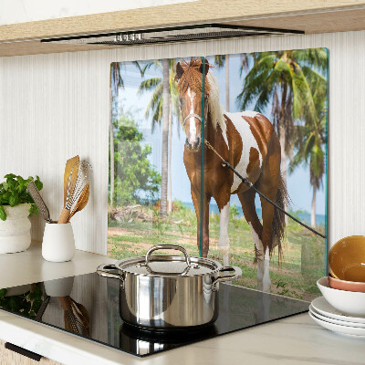 Planche à découper verre Un cheval avec des palmiers en arrière-plan
