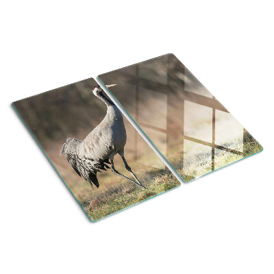 Planche à découper en verre Une grue sur fond de paysage