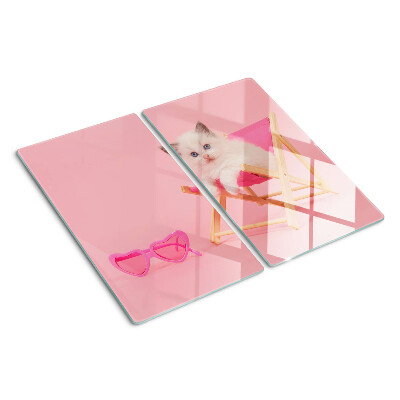 Planche à découper verre Chaton sur une chaise longue sur fond rose