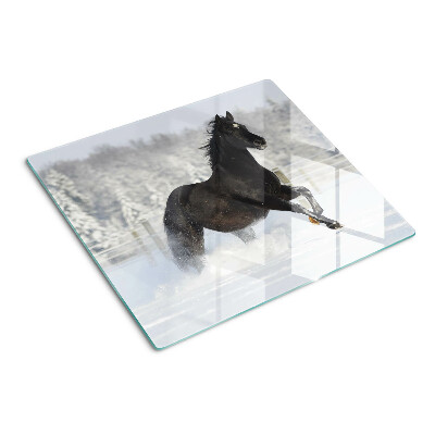 Planche à découper verre Un cheval dans un paysage hivernal