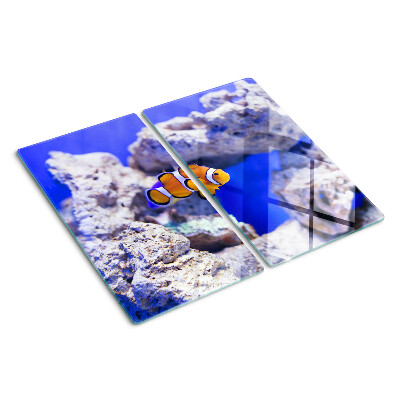 Planche à découper verre Poisson-clown parmi les rochers