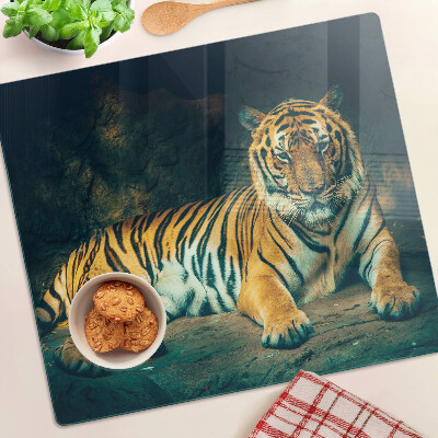 Planche à découper en verre Tigre couché sur les rochers