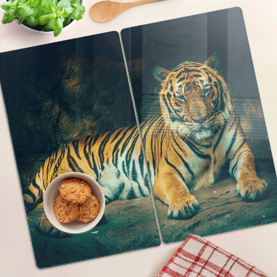 Planche à découper en verre Tigre couché sur les rochers