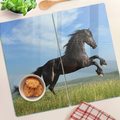 Planche à découper en verre Cheval noir dans le pré