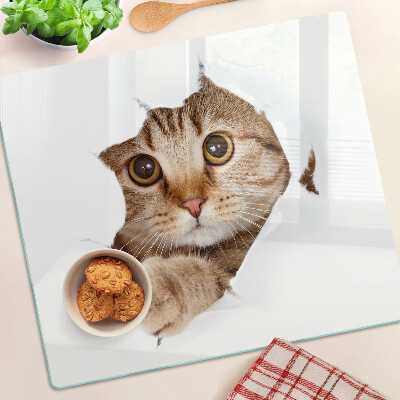 Planche à découper verre Un chat sortant d'un trou