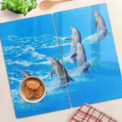 Planche à découper en verre Dauphins sautant par-dessus les vagues