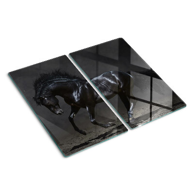 Planche à découper verre Le cheval noir est en mouvement