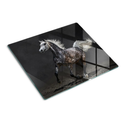 Planche à découper en verre Un cheval tacheté en fuite