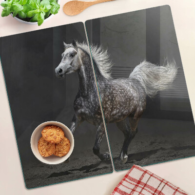 Planche à découper en verre Un cheval tacheté en fuite
