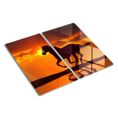 Planche à découper verre Un cheval sur fond de soleil couchant