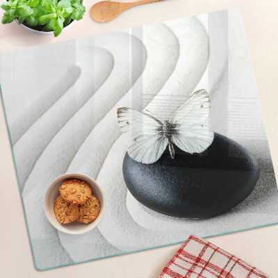 Planche à découper en verre Motif papillon sur pierre