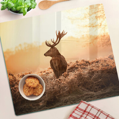 Planche à découper en verre Cerf sur fond de coucher de soleil