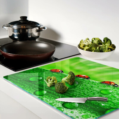 Planche à découper verre Coccinelles sur fond vert