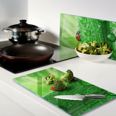 Planche à découper verre Coccinelles sur fond vert