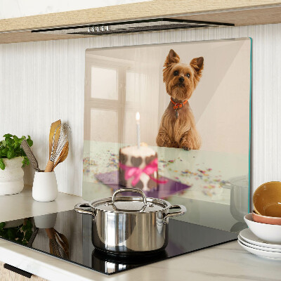 Planche à découper en verre Chien à table avec un gâteau