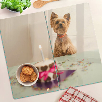 Planche à découper en verre Chien à table avec un gâteau