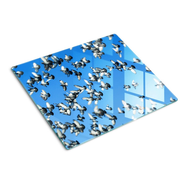 Planche à découper verre Pigeons volant dans le ciel
