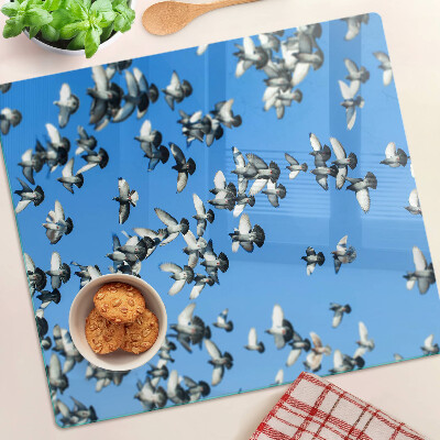 Planche à découper verre Pigeons volant dans le ciel