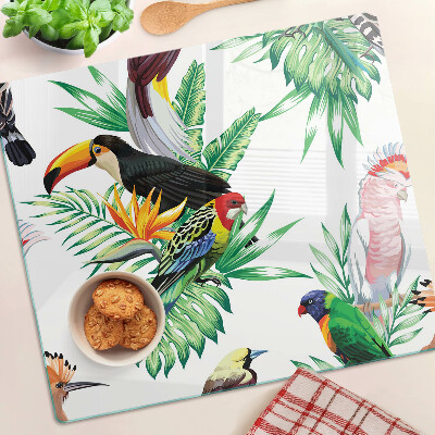 Planche à découper en verre Oiseaux et feuilles tropicales