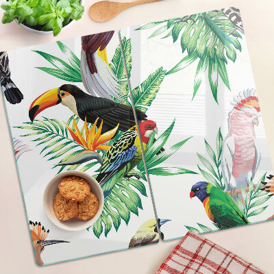 Planche à découper en verre Oiseaux et feuilles tropicales
