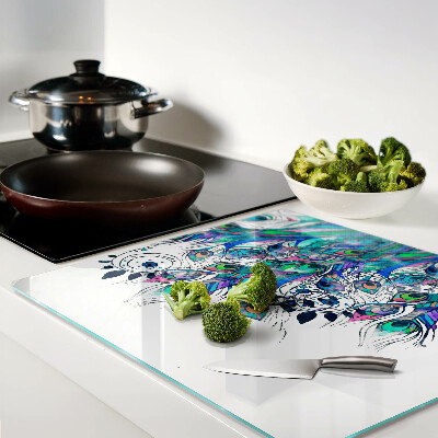 Planche à découper verre Plumes de paon aux couleurs vertes et bleues