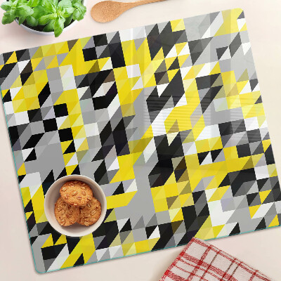 Planche à découper en verre Géométrie dans les tons de jaune et de noir