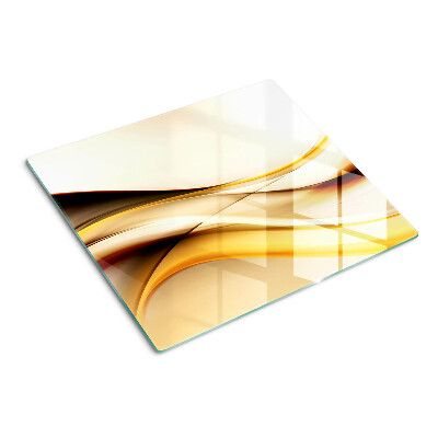 Planche à découper en verre Vagues abstraites dans des tons dorés