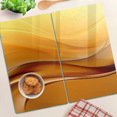 Planche à découper en verre Des vagues aux nuances d'or
