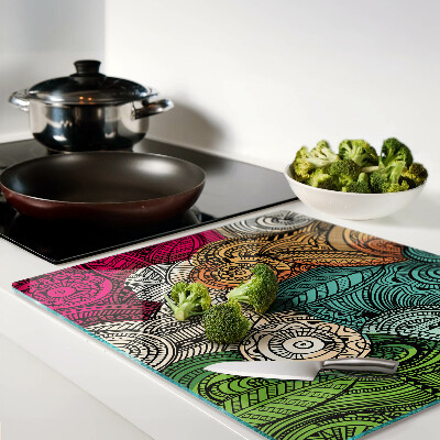 Planche à découper verre Motif mandala aux motifs colorés