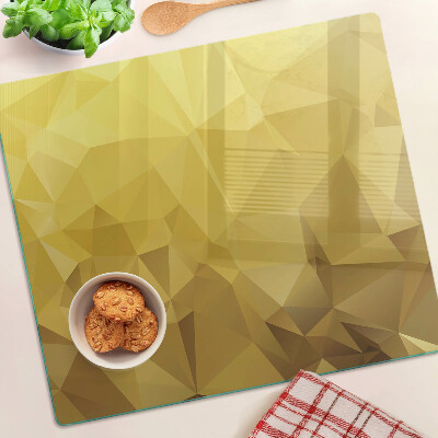 Planche à découper en verre Géométrie dans les tons d'or
