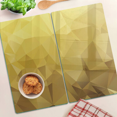 Planche à découper en verre Géométrie dans les tons d'or