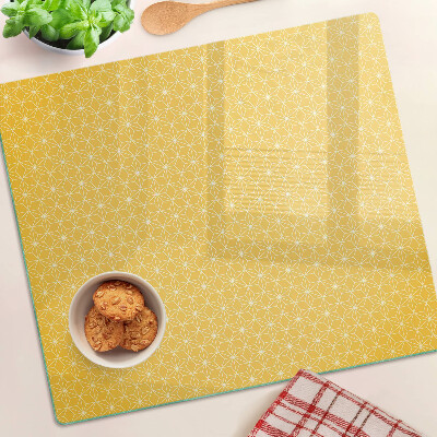 Planche à découper en verre Fleur de vie sur fond jaune