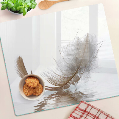 Planche à découper verre Plume sur le fond de l'eau