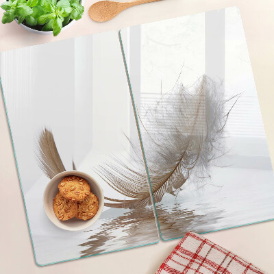 Planche à découper verre Plume sur le fond de l'eau