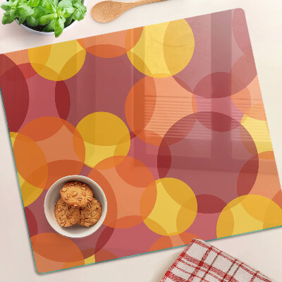 Planche à découper en verre Cercles colorés aux tons chauds