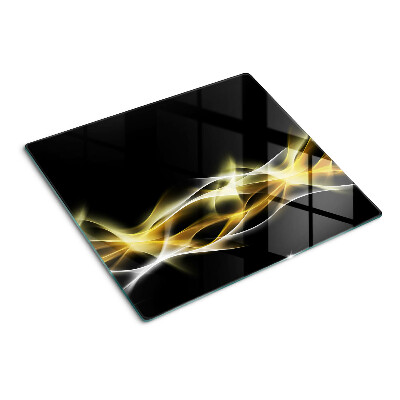 Planche à découper en verre Une vague de lumière aux nuances d'or