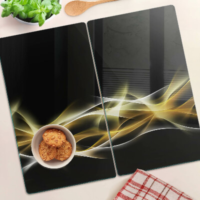 Planche à découper en verre Une vague de lumière aux nuances d'or