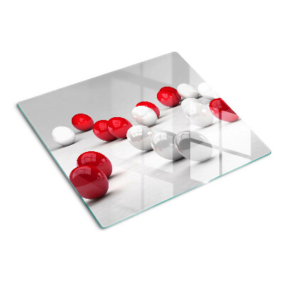Planche à découper en verre Boules rouges et blanches