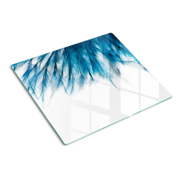 Planche à découper en verre Plumes bleues sur fond blanc