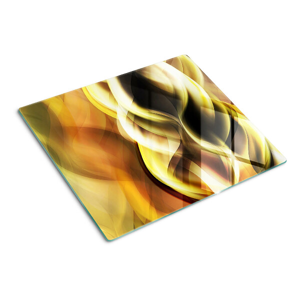 Planche à découper en verre Vagues abstraites dans des tons dorés